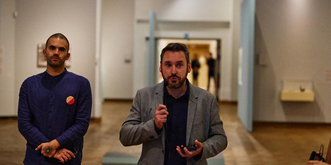 Two of the curators, Edwin Nasr and Arnaud Quertinmont, in the exhibition