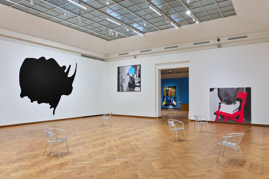 Dwarf and Rhinoceros (With Large Black Shape) © We Document Art