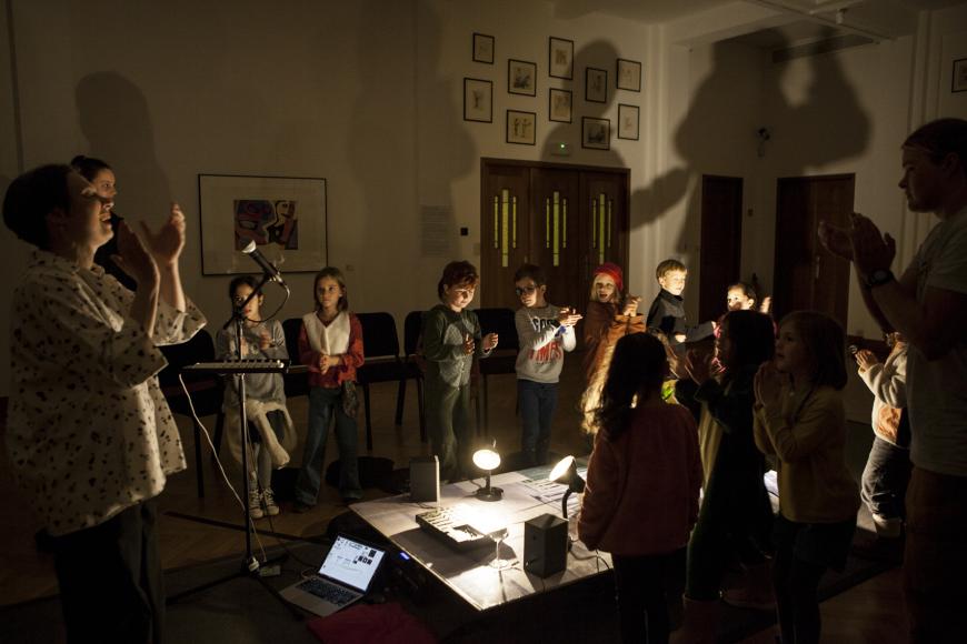 Children participating in a music room